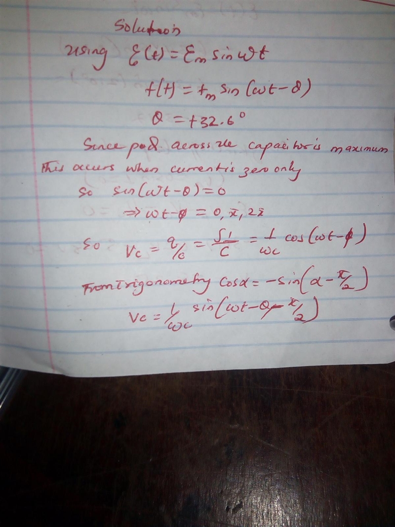 An alternating source drives a series RLC circuit with an emf amplitude of 6.34 V-example-1