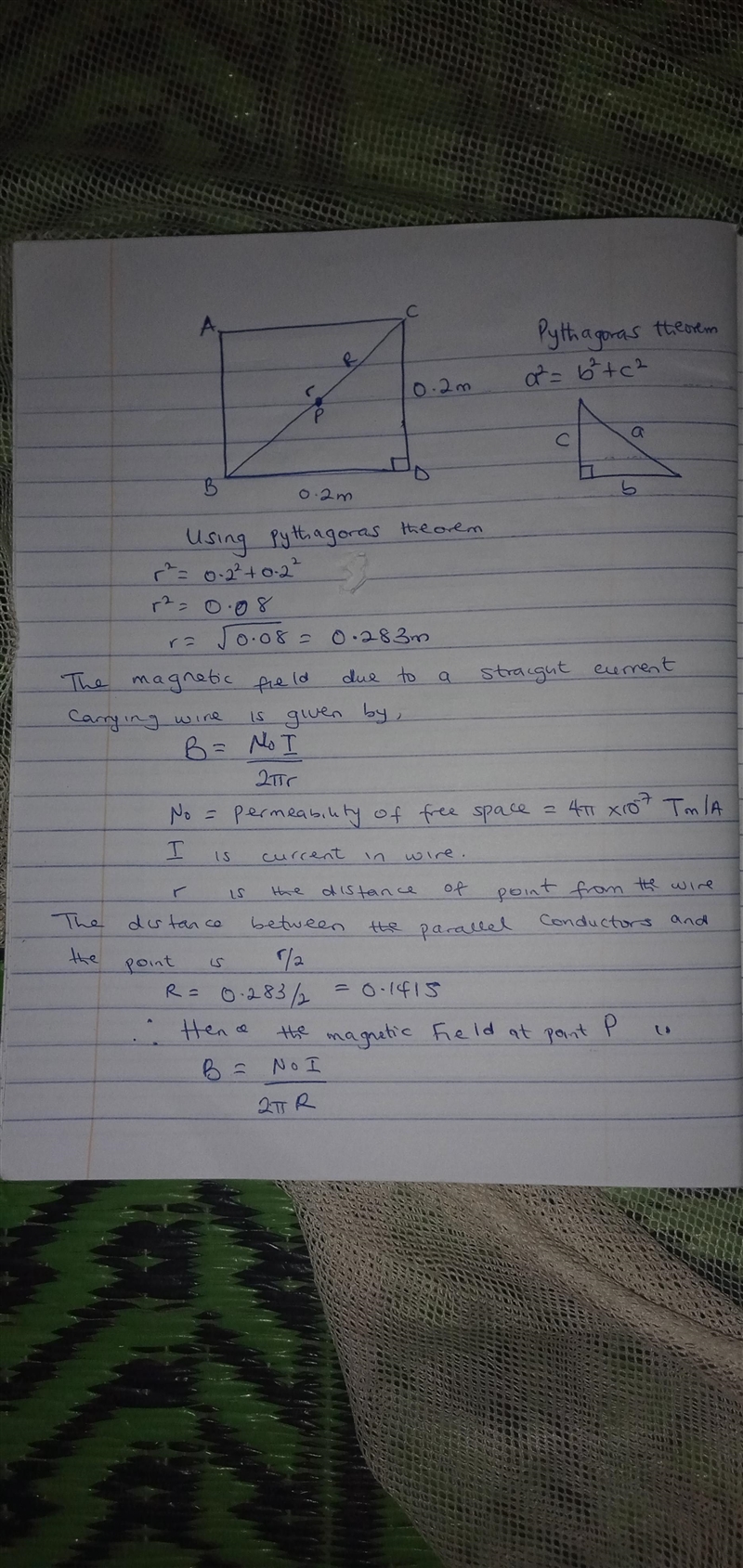 Four long, parallel conductors carry equal currents of I = 5.00 A. The direction of-example-1