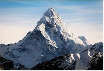 Which force most likely created this mountain? compression gravity shearing tension-example-1