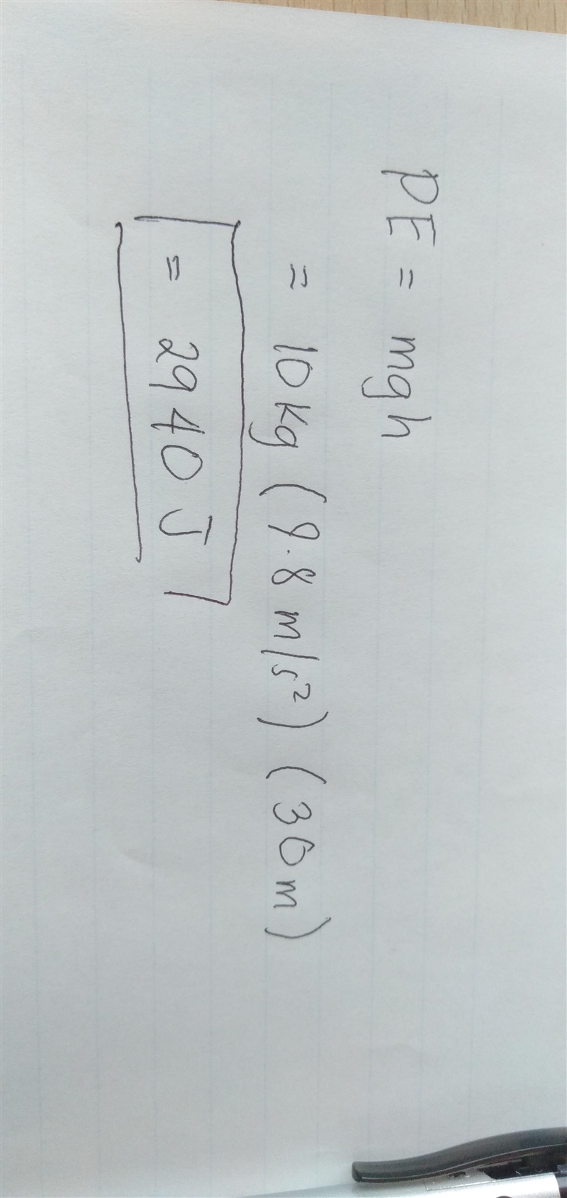 A 10 kg ball is held above a building with a height of 30 m. What is the potential-example-1