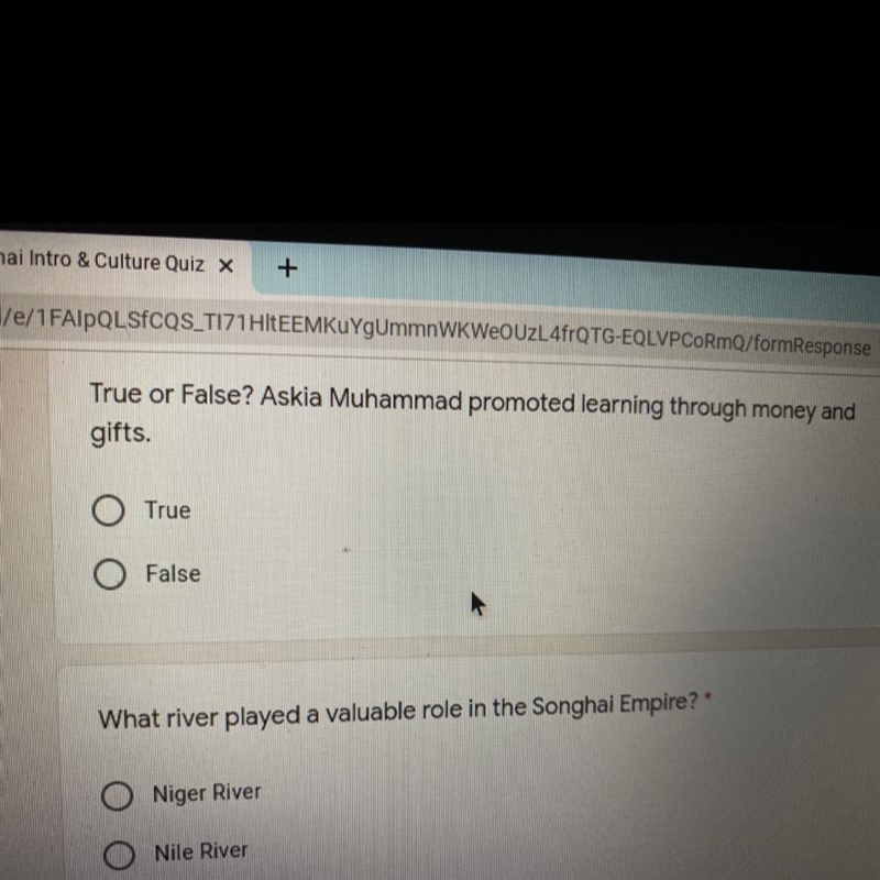 True or False? Askia Muhammad promoted learning through money and gifts.-example-1