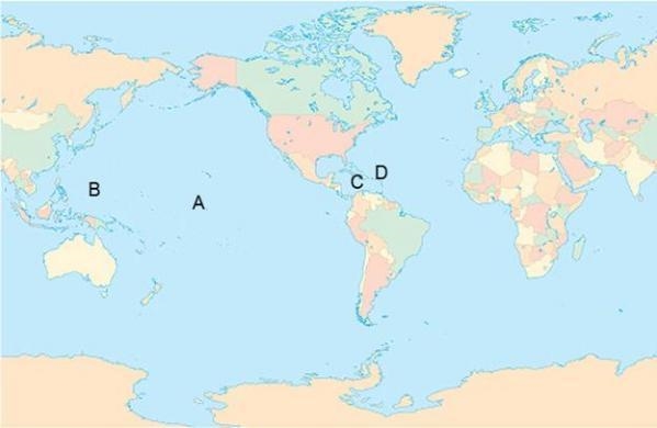 Kingman Reef is a U.S. territory that is south of Hawaii. Which letter on the map-example-1