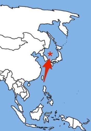 What body of water is represented by the red star on the map? Coral Sea Sea of Japan-example-1