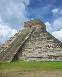 The picture above is from the Mayan ruins at Chichen Itza. What do these ruins tell-example-1