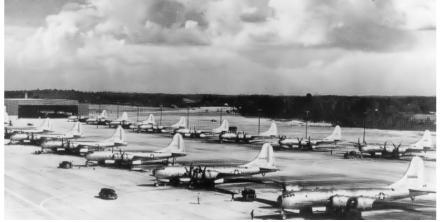 Look at the 1945 photograph of the Bell Bomber Plant in Marietta, Georgia. Then answer-example-1