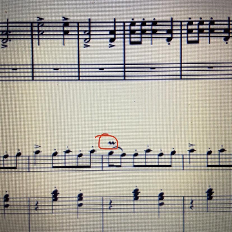 what does the squiggle above the notes mean and how do you play it on the violin/ viola-example-1