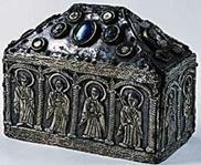 Look at this image and then answer, what is a reliquary? Question 4 options: A a container-example-1