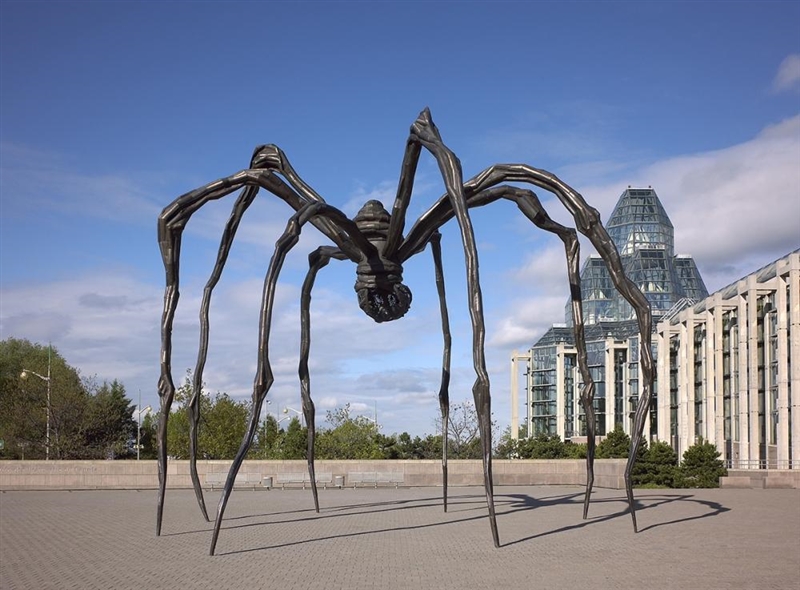 What element of art does Louise Bourgeois use in the Maman? A Balance B Color C Form-example-1