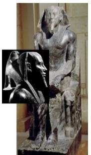 A relief sculpture of an Egyptian woman with her hands on a man's shoulders. The man-example-1