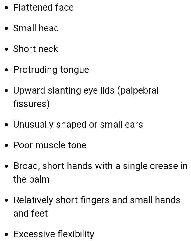 Describe the cause and symptoms of Down syndrome.-example-2