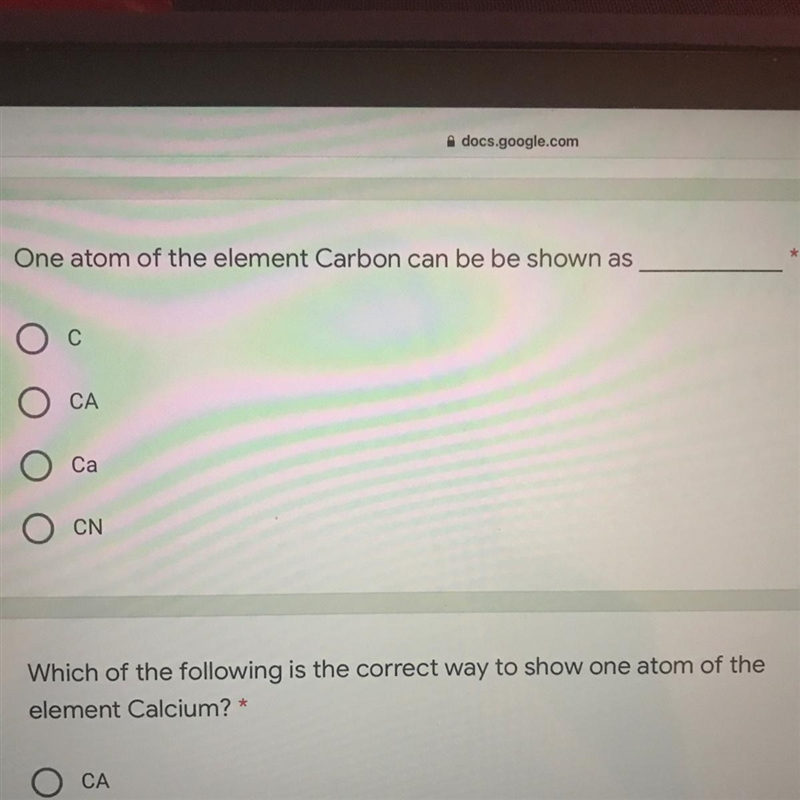 One atom of the element carbon can be shown as C CA Ca CN-example-1