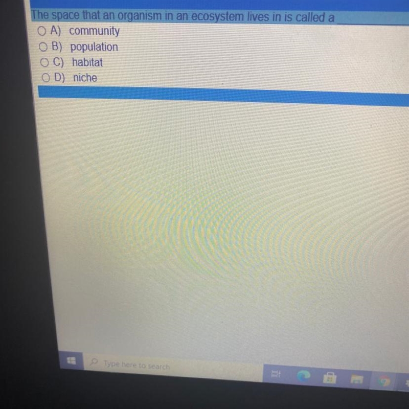 The space that an organism in an ecosystem lives in is called a A) community B) population-example-1