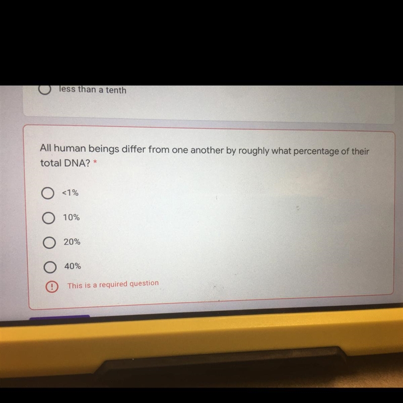 All human beings differ from one another by roughly what percentage of their total-example-1