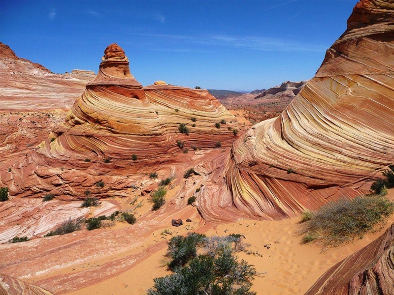 Erosion is the geological process in which earth materials are worn away and transported-example-1