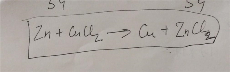 Zinc reacts with Copper (II) chloride to produce Copper and Zinc chloride. -write-example-1