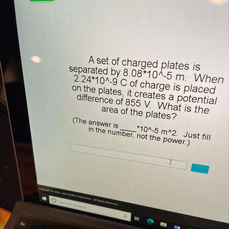 A set of charged plates is separated by 8.08*10^-5 m. When 2.24*10^-9 C of charge-example-1