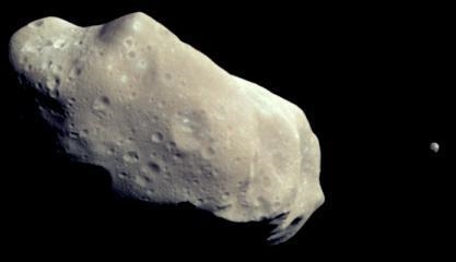 The image above was taken by the Galileo spacecraft as it visited the asteroid belt-example-1