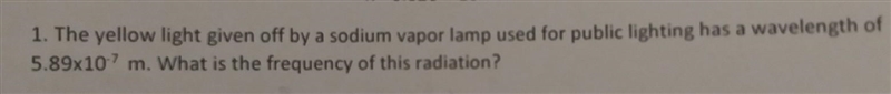 The yellow light given off by a sodium vapor lamp used for public lighting has a wavelength-example-1