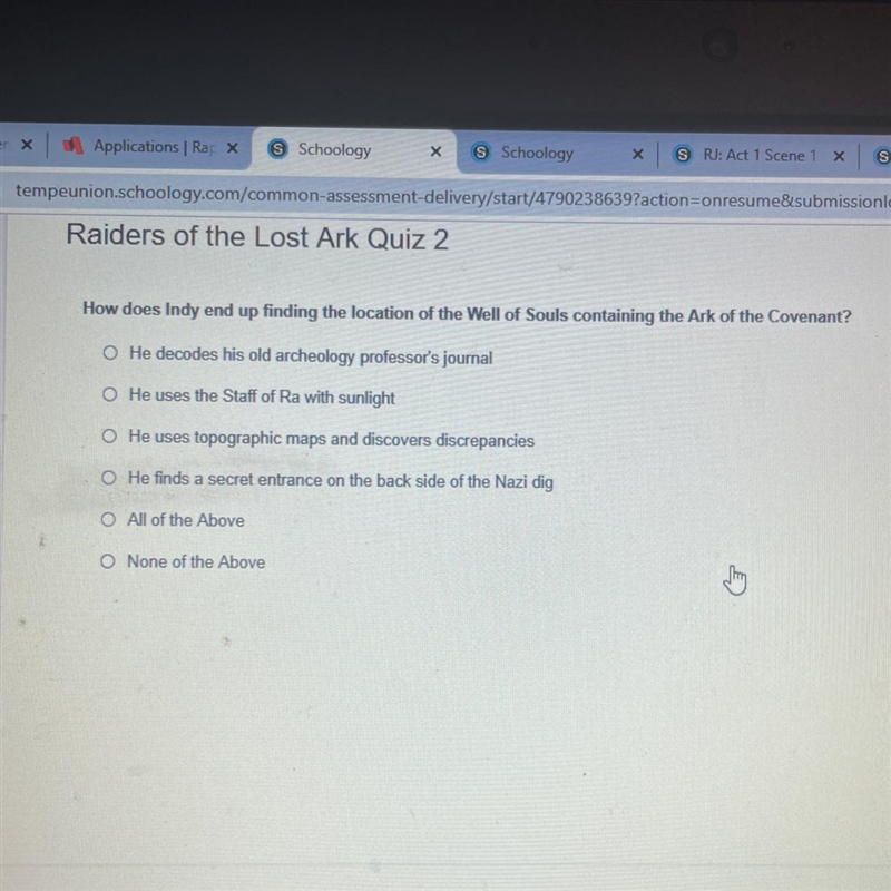 How does Indy end up finding the location of the Well of Souls containing the Ark-example-1