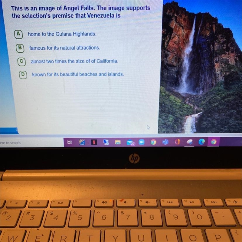 This is an image of Angel Falls. The image supports the selection's premise that Venezuela-example-1