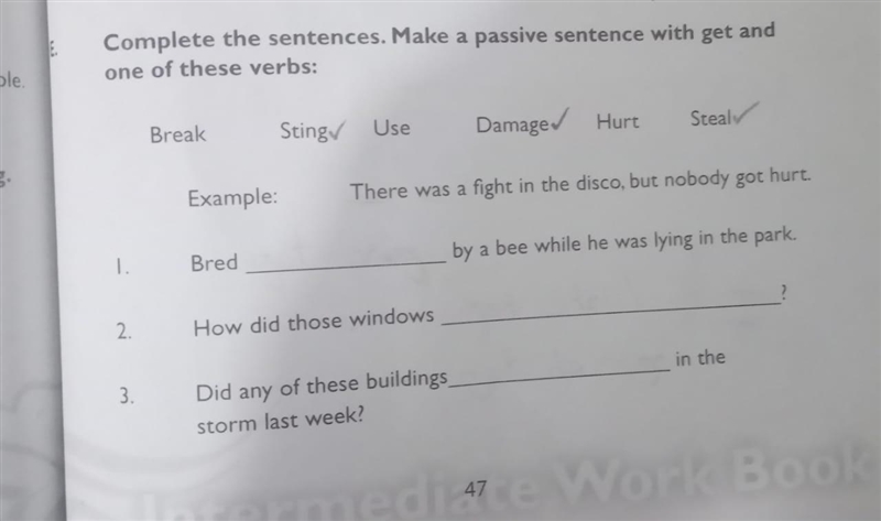 Complete the sentences. make a passive sentence with get and one of these verbs: -break-example-1