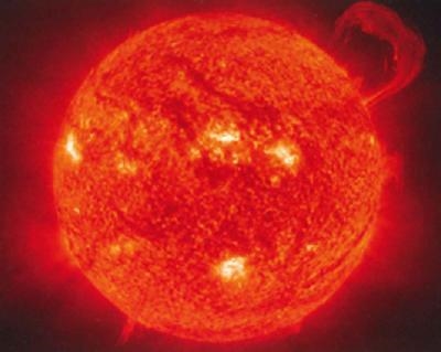 Look at this image of the sun. The sun, a large, glowing sphere. This image helps-example-1