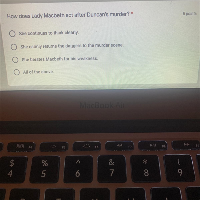 How does lady Macbeth act after Duncan‘s murder-example-1