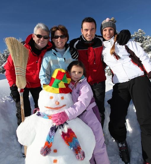 Look at the photo of a French family below. Using your imagination, describe the people-example-1