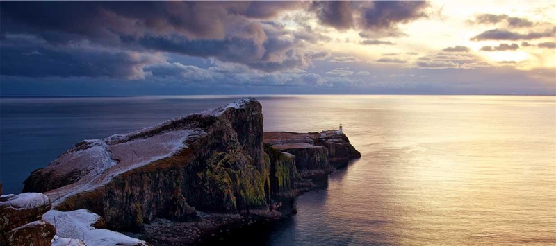 Skye is a beautiful island off west _ of Scotland​-example-1