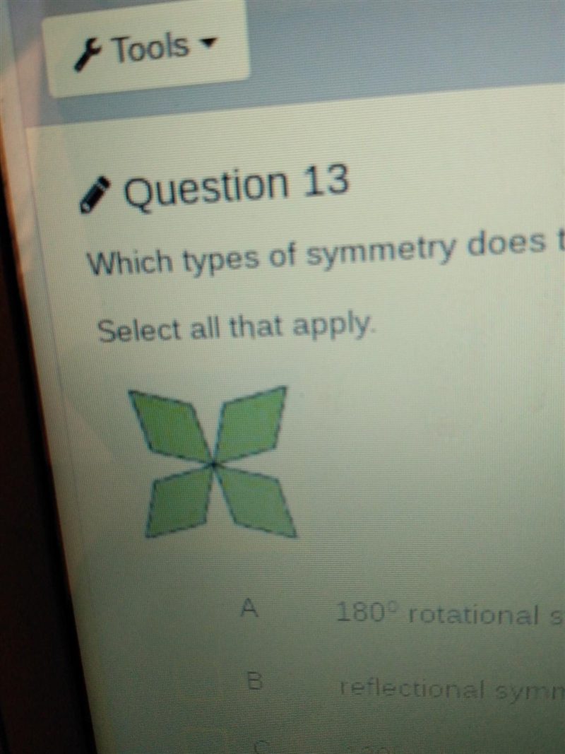 Which types of symmetry does the figure display? Select all that apply​-example-1