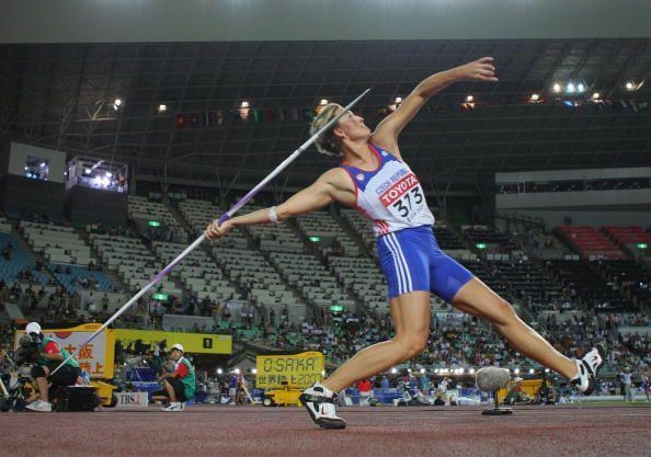 An event where an athlete runs and throws a spear ​-example-1