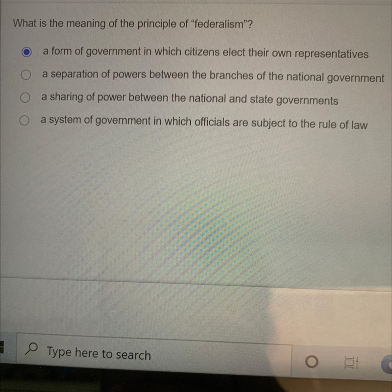 What is the meaning of the principle of "federalism"? a form of government-example-1