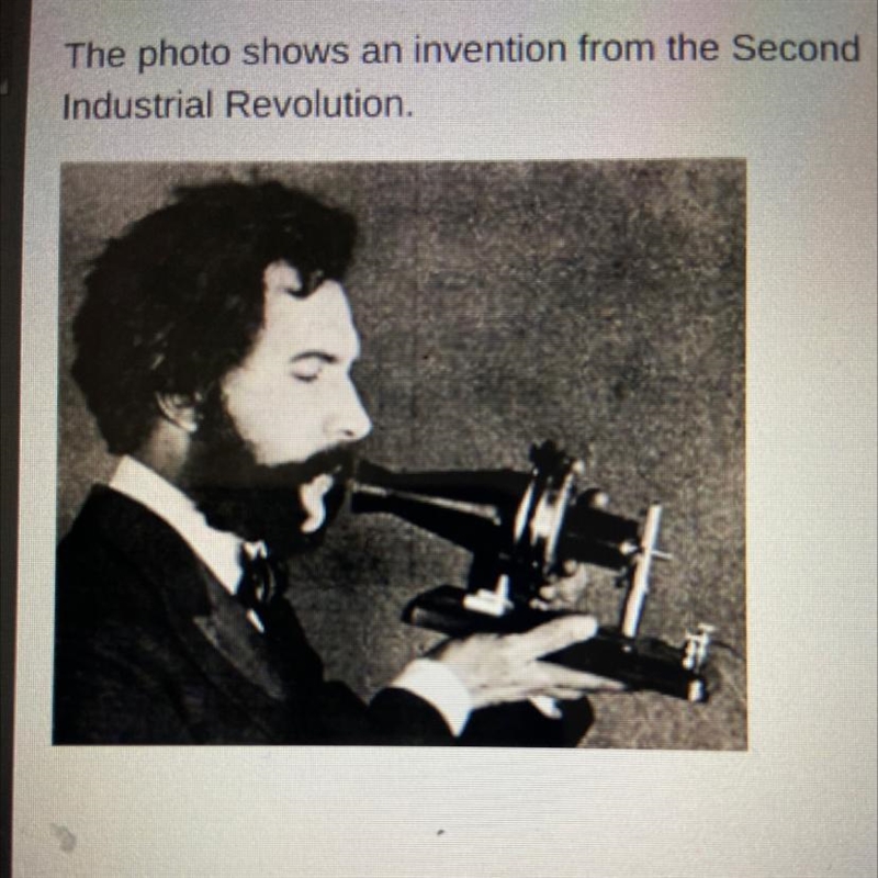 Which invention does the photo show? O the alternating current engine O the telephone-example-1