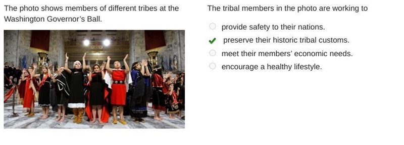 The tribal members in the photo are working to A) provide safety to their nations-example-1