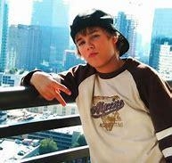 How old was Justin Bieber in the year 2001 and picture of him please . Thanks.-example-1