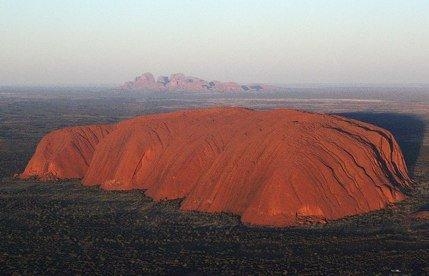 This is a photograph of Ayers Rock, located in what country? A) Kenya B) Australia-example-1