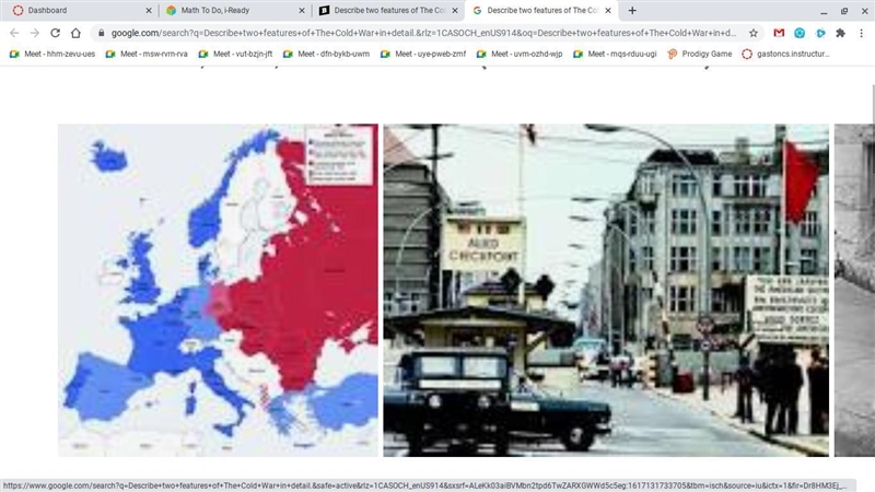 Describe two features of The Cold War in detail.-example-1