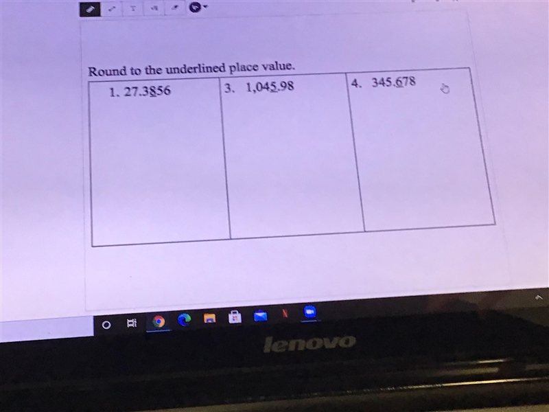 Round to the underlined place value.-example-1