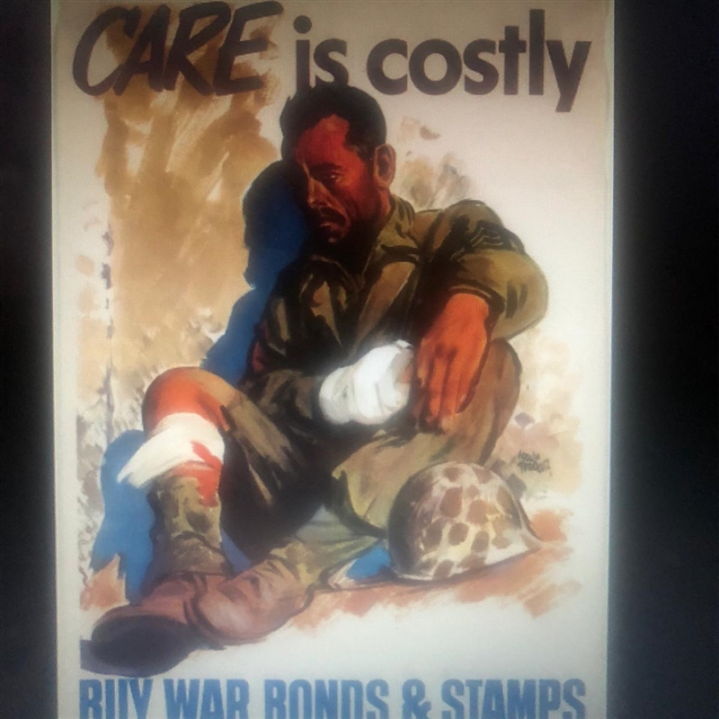 How does this picture attack the emotions and bring people over to buy war bonds?-example-1