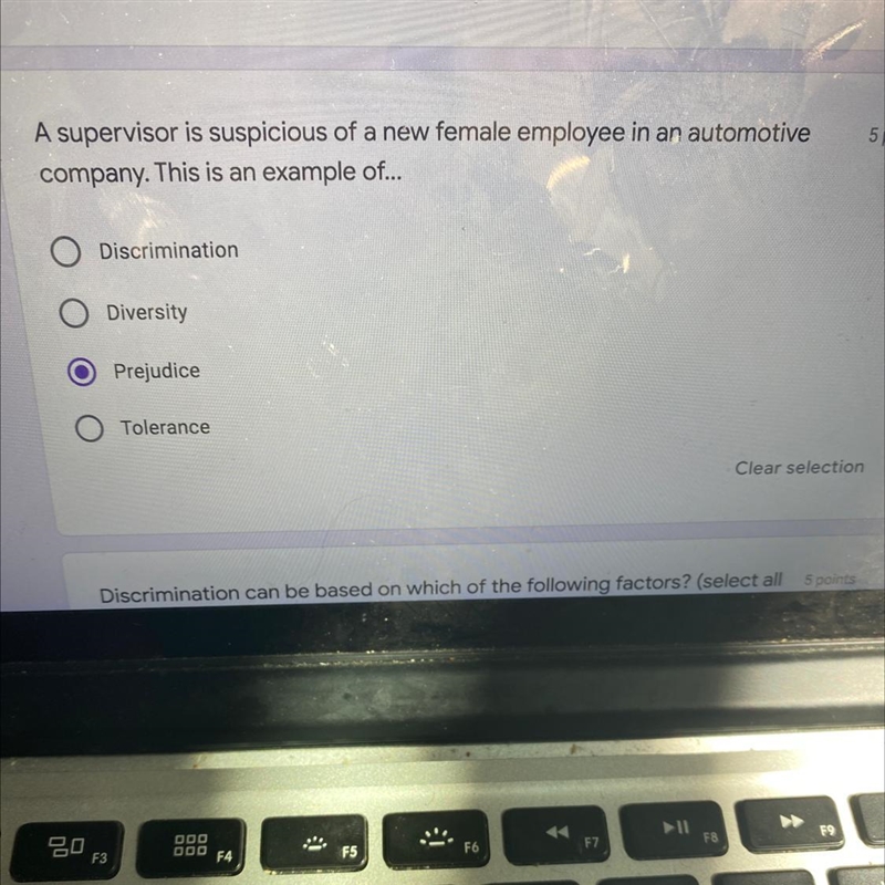 A supervisor is suspicious of a new female employee in an automotive company. This-example-1