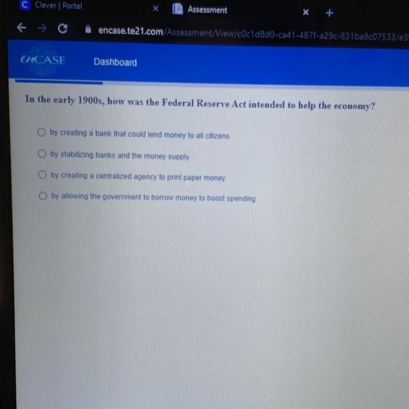 In the early 1900s, how was the Federal Reserve Act intended to help the economy?-example-1