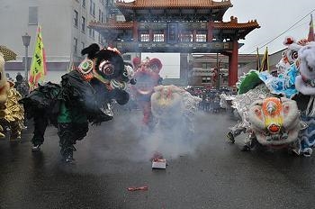 The photo shows a Chinese New Year celebration in Seattle. Which statement is true-example-1