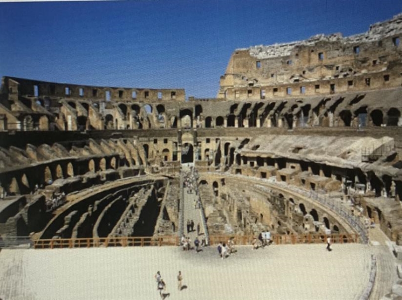 Which famous Roman structure do you see pictured here? A. The Amphitheatre B. The-example-1