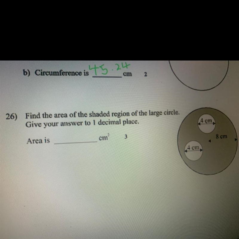 Find the area of the shaded region of the large circle. give your answer to 1 decimal-example-1