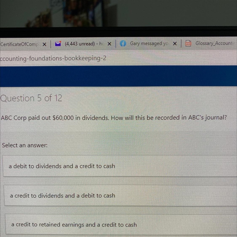 Company paid out $60,000 in dividends. How will this be recorded in journal?-example-1