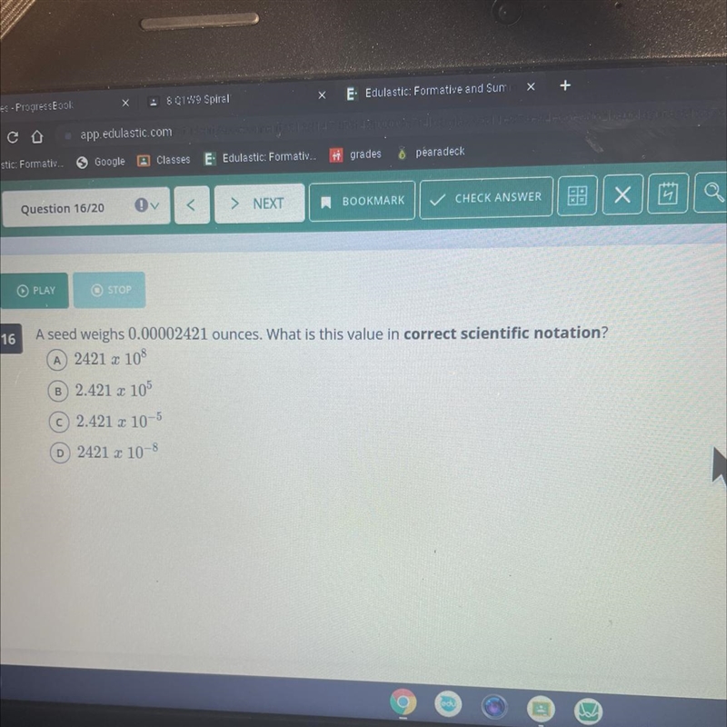 A seed weighs 0.00002421 ounces. What is this value in correct scientific notation-example-1