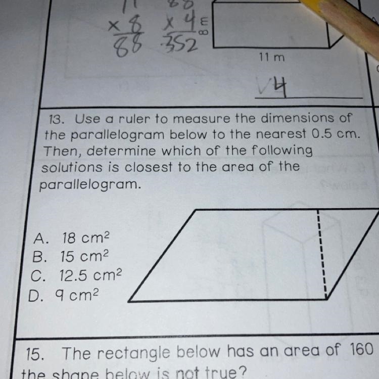 13. Use a ruler to measure the dimensions of the parallelogram below to the nearest-example-1