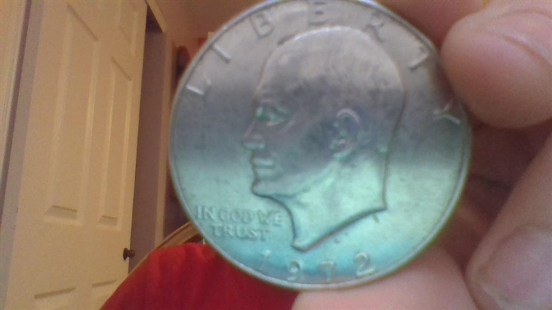 What kind of coin is this? i found it on the sidewalk:-example-1