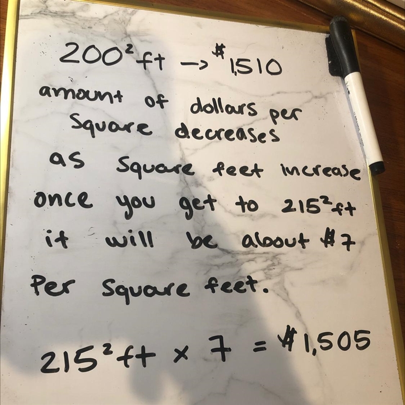 Michelle wants to carpet a room that is 215 square feet. The chart below indicates-example-1