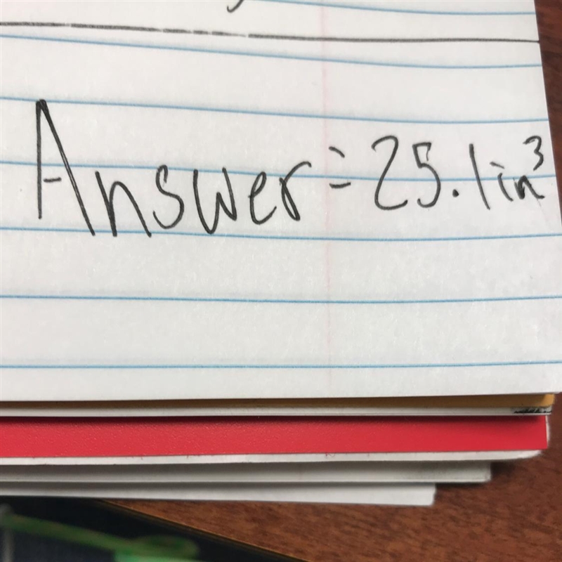 A can of juice is 6 inches high, a base has a diameter of 4 inches . What is the volume-example-1